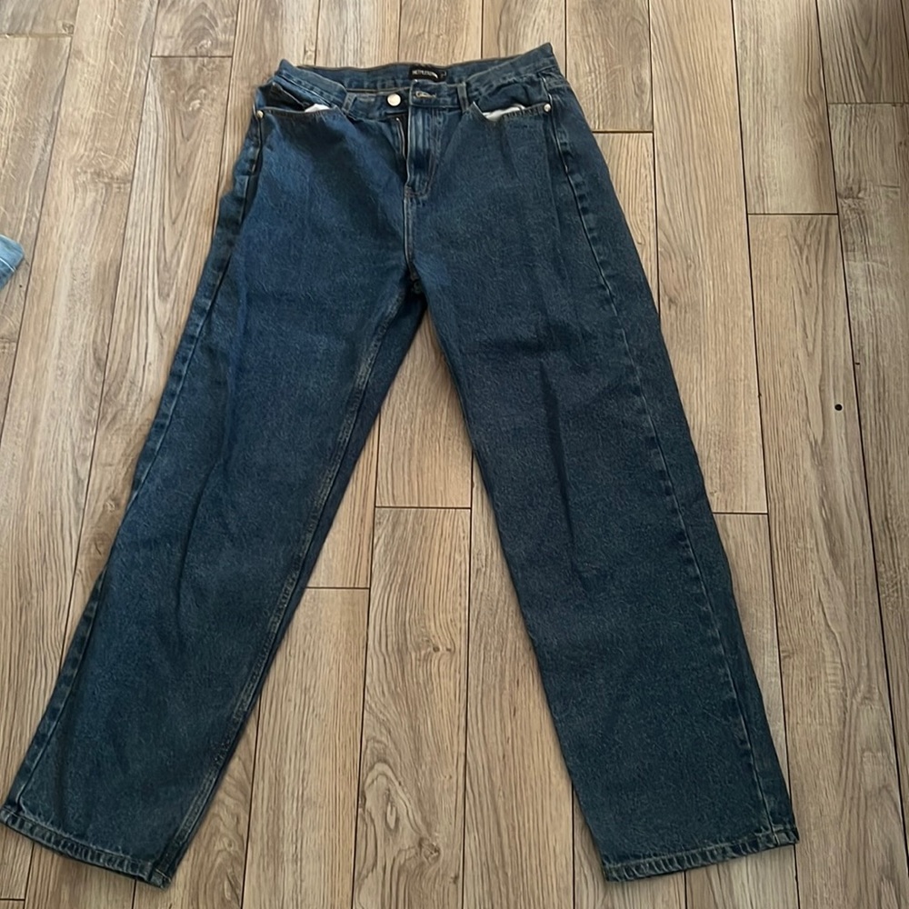 Dark blue jeans. Size 6. Baggy/loose fit. Never worn.